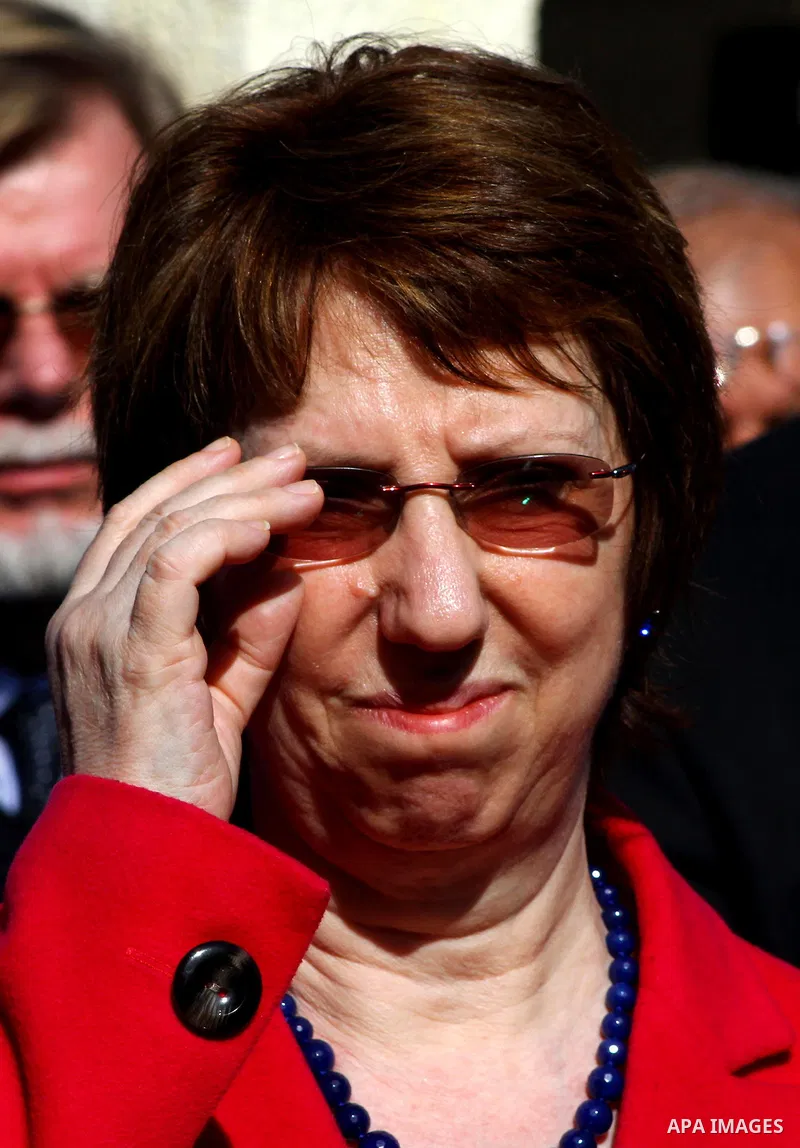 EU Foreign Policy Chief Catherine Ashton shields her eyes from the sun as she visits the UN Relief and Works Agency (UNRWA), in Gaza City , on January 25, 2012. Ashton said that the informal talks between Israel and the...