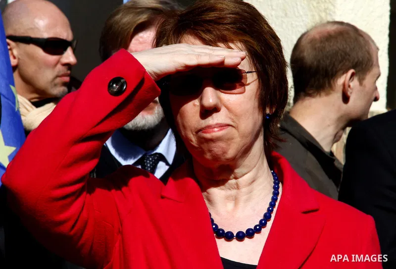 EU Foreign Policy Chief Catherine Ashton shields her eyes from the sun as she visits the UN Relief and Works Agency (UNRWA), in Gaza City , on January 25, 2012. Ashton said that the informal talks between Israel and the...