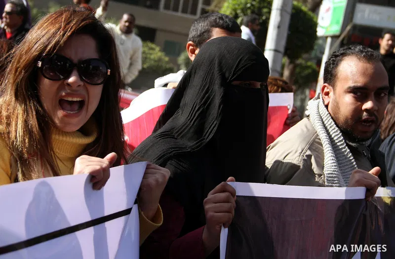Egyptian demonstrators gather to celebrate the one year anniversary of the 25th January uprising at Tahrir square in Cairo, Egypt, 25 January 2012. One year earlier the same day Egyptians started an uprising which result...