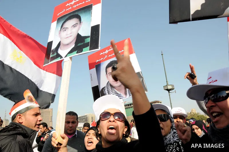 Egyptian demonstrators gather to celebrate the one year anniversary of the 25th January uprising at Tahrir square in Cairo, Egypt, 25 January 2012. One year earlier the same day Egyptians started an uprising which result...