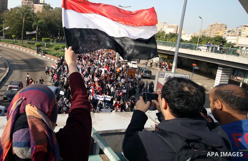 Egyptian demonstrators gather to celebrate the one year anniversary of the 25th January uprising at Tahrir square in Cairo, Egypt, 25 January 2012. One year earlier the same day Egyptians started an uprising which result...