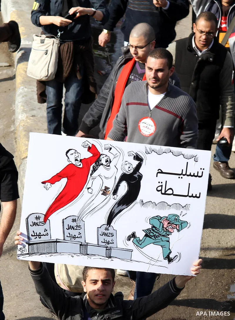 Egyptian demonstrators gather to celebrate the one year anniversary of the 25th January uprising at Tahrir square in Cairo, Egypt, 25 January 2012. One year earlier the same day Egyptians started an uprising which result...