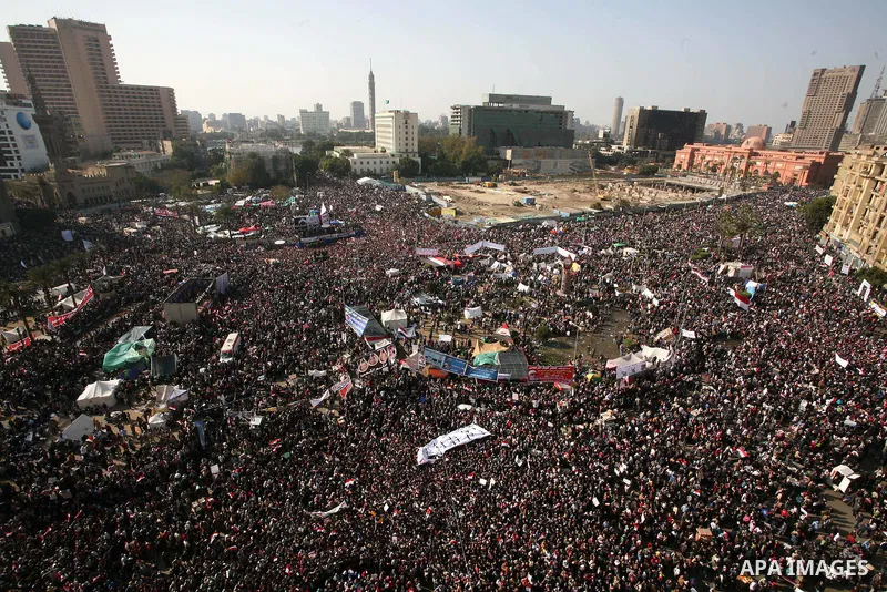 Egyptian demonstrators gather to celebrate the one year anniversary of the 25th January uprising at Tahrir square in Cairo, Egypt, 25 January 2012. One year earlier the same day Egyptians started an uprising which result...