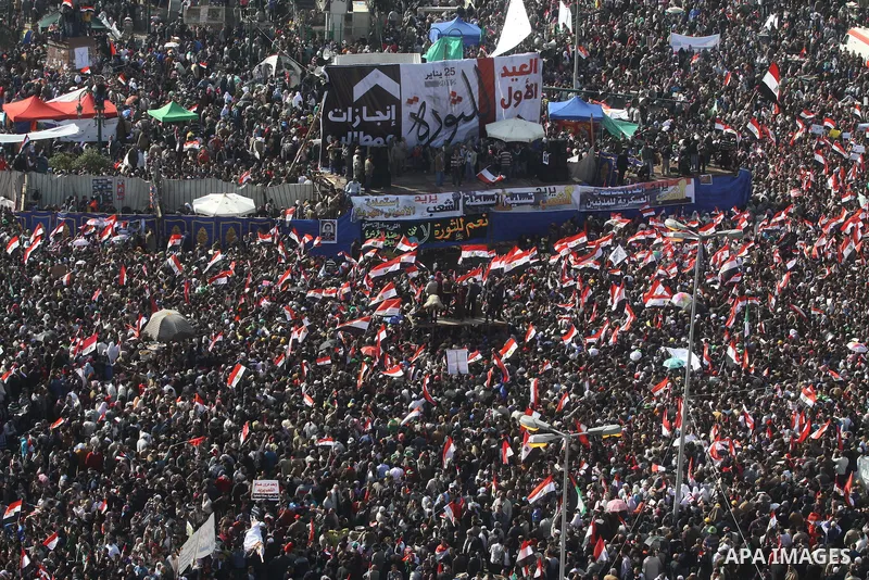 Egyptian demonstrators gather to celebrate the one year anniversary of the 25th January uprising at Tahrir square in Cairo, Egypt, 25 January 2012. One year earlier the same day Egyptians started an uprising which result...