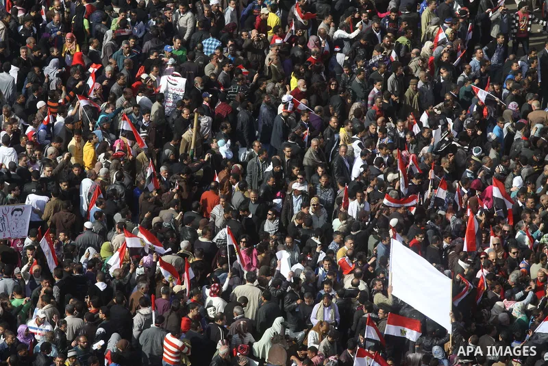 Egyptian demonstrators gather to celebrate the one year anniversary of the 25th January uprising at Tahrir square in Cairo, Egypt, 25 January 2012. One year earlier the same day Egyptians started an uprising which result...