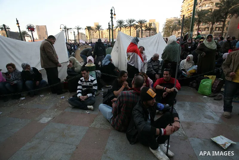 Egyptian demonstrators gather to celebrate the one year anniversary of the 25th January uprising at Tahrir square in Cairo, Egypt, 25 January 2012. One year earlier the same day Egyptians started an uprising which result...