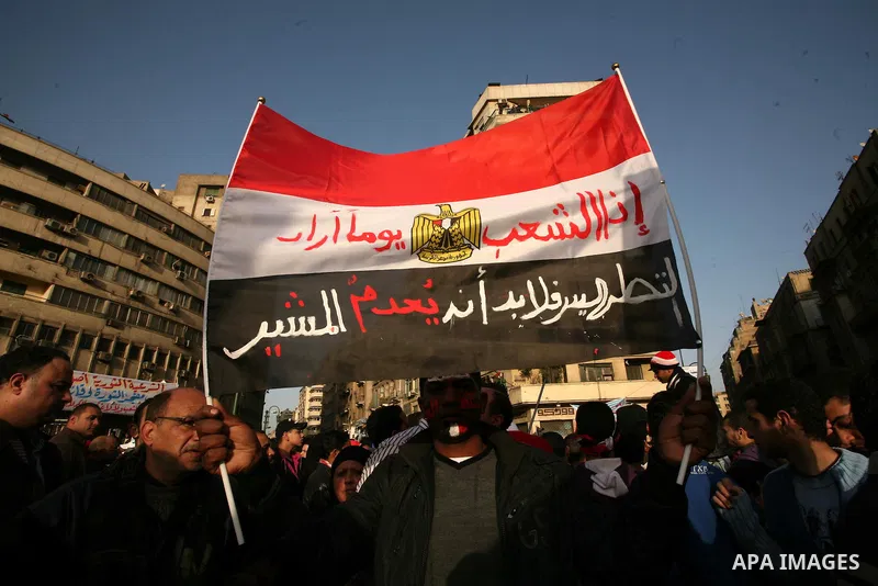 Egyptian demonstrators gather to celebrate the one year anniversary of the 25th January uprising at Tahrir square in Cairo, Egypt, 25 January 2012. One year earlier the same day Egyptians started an uprising which result...