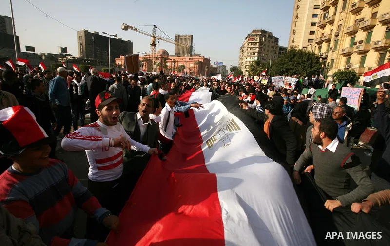Egyptian demonstrators gather to celebrate the one year anniversary of the 25th January uprising at Tahrir square in Cairo, Egypt, 25 January 2012. One year earlier the same day Egyptians started an uprising which result...