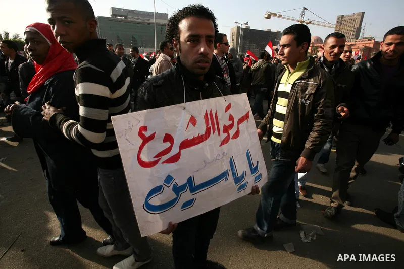 Egyptian demonstrators gather to celebrate the one year anniversary of the 25th January uprising at Tahrir square in Cairo, Egypt, 25 January 2012. One year earlier the same day Egyptians started an uprising which result...