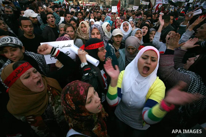Egyptian demonstrators gather to celebrate the one year anniversary of the 25th January uprising at Tahrir square in Cairo, Egypt, 25 January 2012. One year earlier the same day Egyptians started an uprising which result...