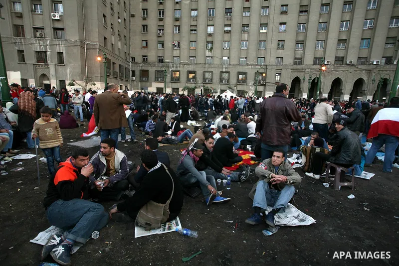 Egyptian demonstrators gather to celebrate the one year anniversary of the 25th January uprising at Tahrir square in Cairo, Egypt, 25 January 2012. One year earlier the same day Egyptians started an uprising which result...