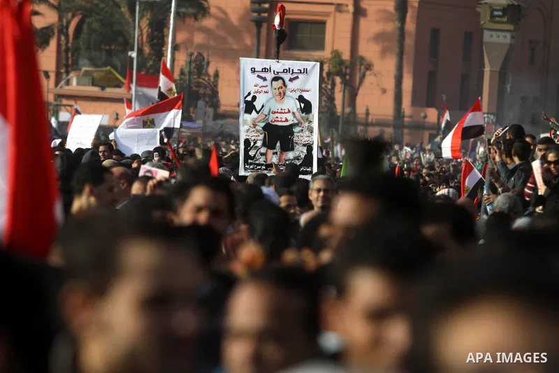 Egyptian demonstrators gather to celebrate the one year anniversary of the 25th January uprising at Tahrir square in Cairo, Egypt, 25 January 2012. One year earlier the same day Egyptians started an uprising which result...
