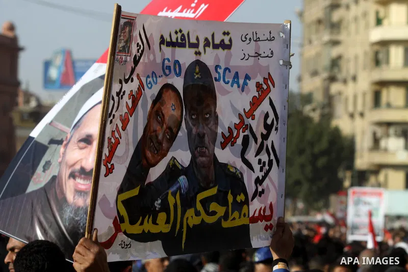 Egyptian demonstrators gather to celebrate the one year anniversary of the 25th January uprising at Tahrir square in Cairo, Egypt, 25 January 2012. One year earlier the same day Egyptians started an uprising which result...