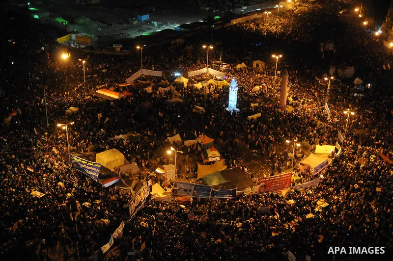 Egyptian demonstrators gather during a rally in Tahrir Square to mark the one year anniversary of the uprising that ousted President Hosni Mubarak in Cairo, Egypt, Wednesday, Jan. 25, 2012. Crowds of several hundred thou...