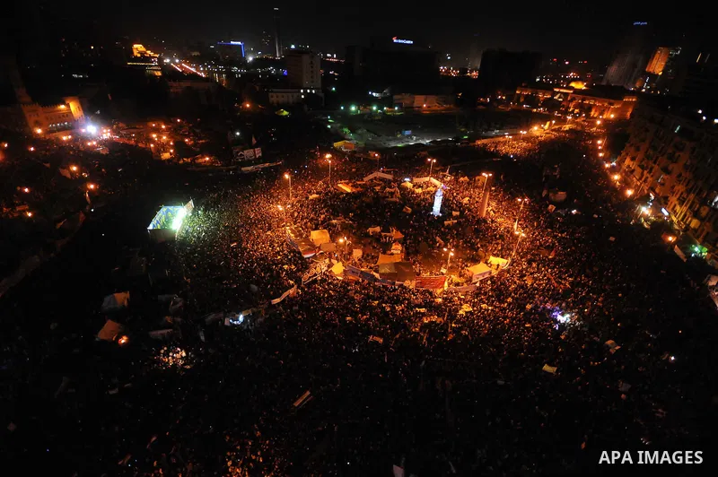 Egyptian demonstrators gather during a rally in Tahrir Square to mark the one year anniversary of the uprising that ousted President Hosni Mubarak in Cairo, Egypt, Wednesday, Jan. 25, 2012. Crowds of several hundred thou...