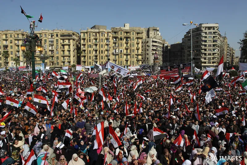 Egyptian demonstrators gather to celebrate the one year anniversary of the 25th January uprising at Tahrir square in Cairo, Egypt, 25 January 2012. One year earlier the same day Egyptians started an uprising which result...
