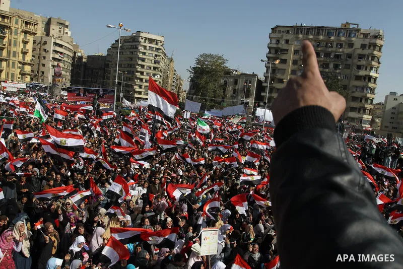 Egyptian demonstrators gather to celebrate the one year anniversary of the 25th January uprising at Tahrir square in Cairo, Egypt, 25 January 2012. One year earlier the same day Egyptians started an uprising which result...
