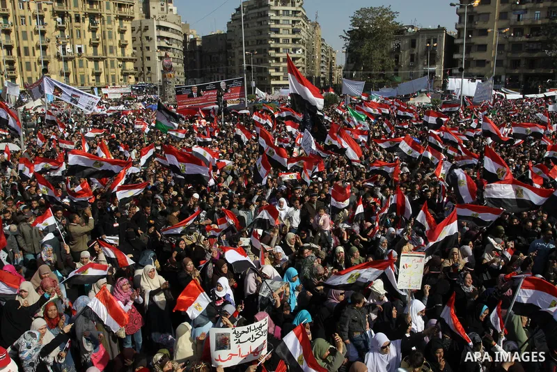 Egyptian demonstrators gather to celebrate the one year anniversary of the 25th January uprising at Tahrir square in Cairo, Egypt, 25 January 2012. One year earlier the same day Egyptians started an uprising which result...