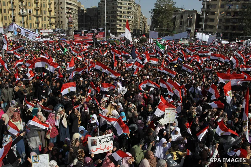 Egyptian demonstrators gather to celebrate the one year anniversary of the 25th January uprising at Tahrir square in Cairo, Egypt, 25 January 2012. One year earlier the same day Egyptians started an uprising which result...