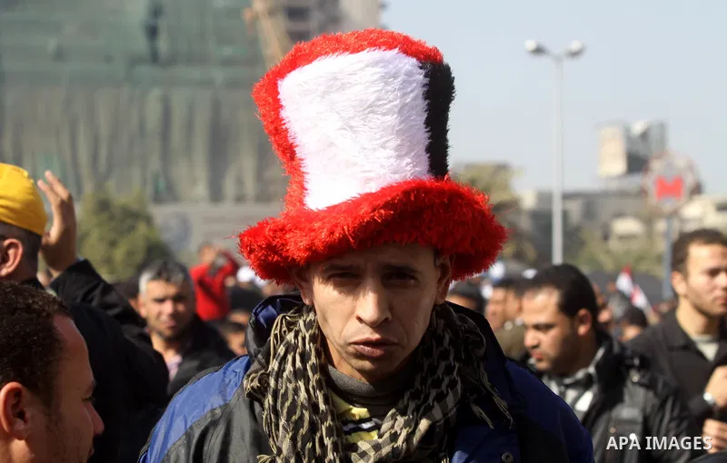 Egyptian demonstrators gather to celebrate the one year anniversary of the 25th January uprising at Tahrir square in Cairo, Egypt, 25 January 2012. One year earlier the same day Egyptians started an uprising which result...