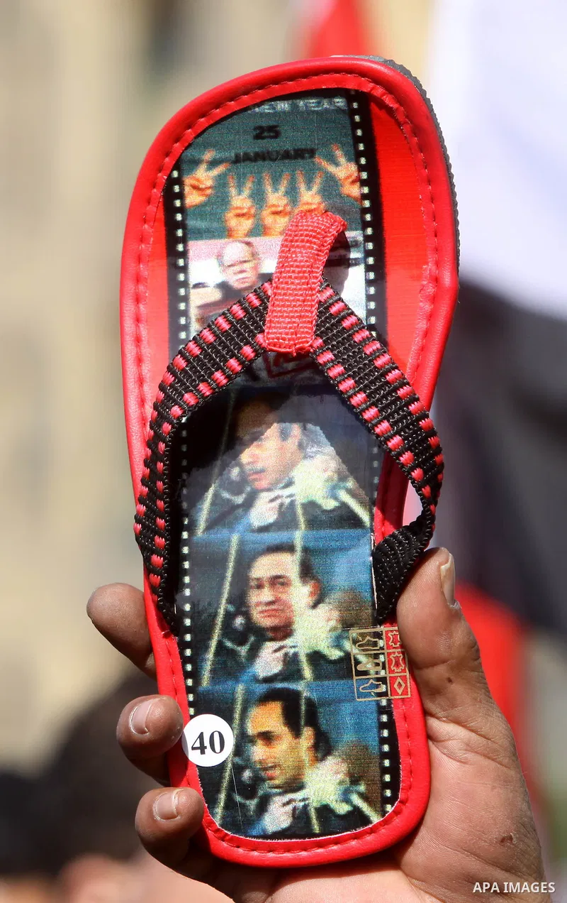 Egyptian demonstrators gather to celebrate the one year anniversary of the 25th January uprising at Tahrir square in Cairo, Egypt, 25 January 2012. One year earlier the same day Egyptians started an uprising which result...