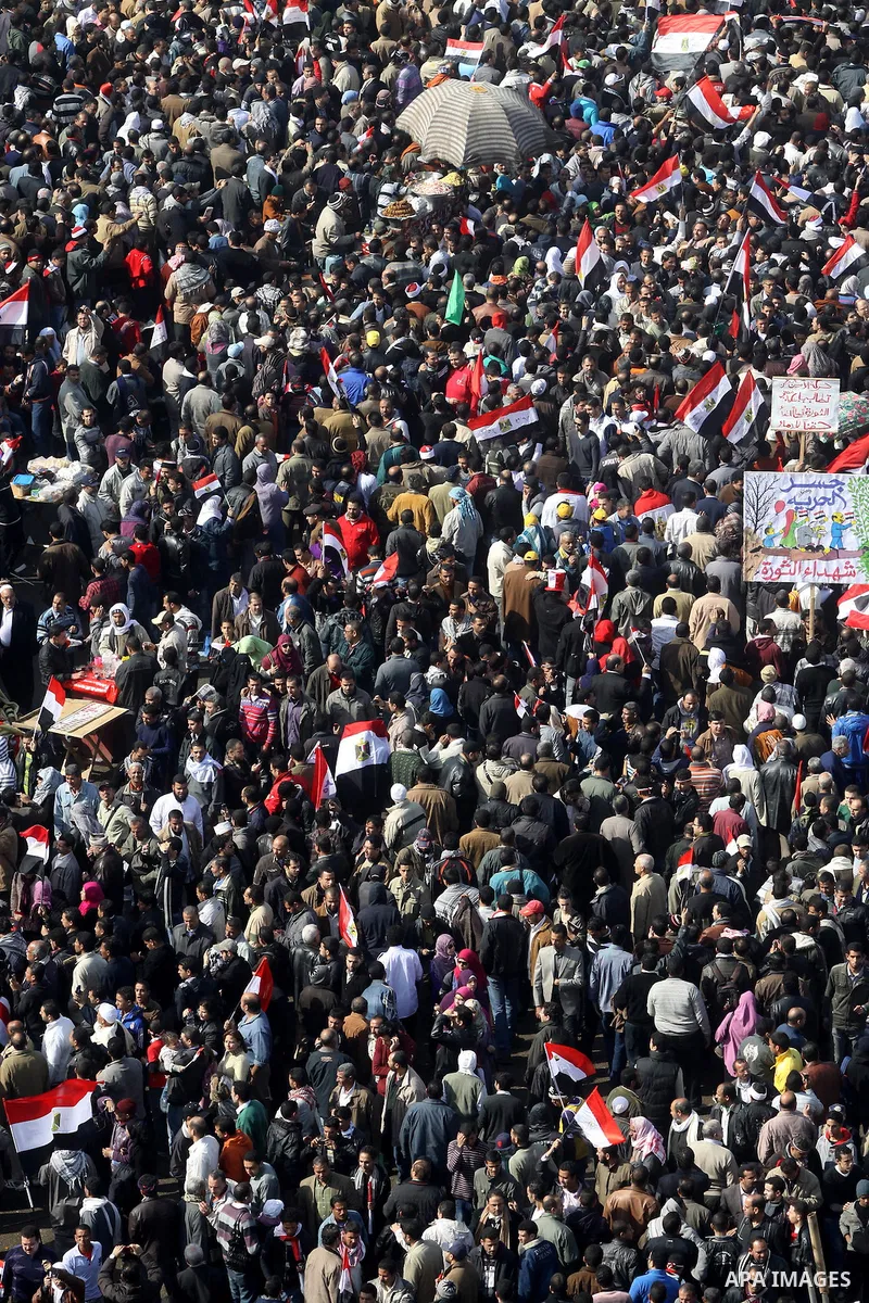 Egyptian demonstrators gather to celebrate the one year anniversary of the 25th January uprising at Tahrir square in Cairo, Egypt, 25 January 2012. One year earlier the same day Egyptians started an uprising which result...