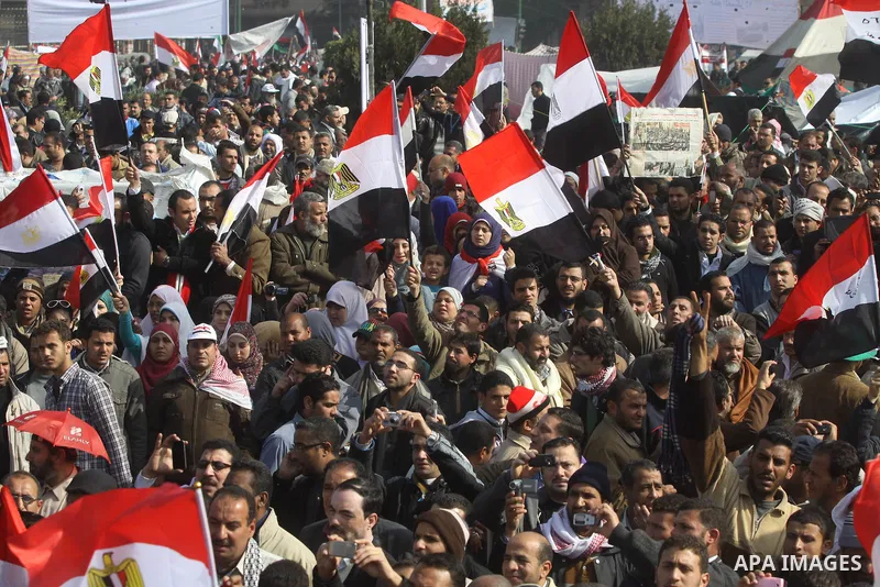 Egyptian demonstrators gather to celebrate the one year anniversary of the 25th January uprising at Tahrir square in Cairo, Egypt, 25 January 2012. One year earlier the same day Egyptians started an uprising which result...