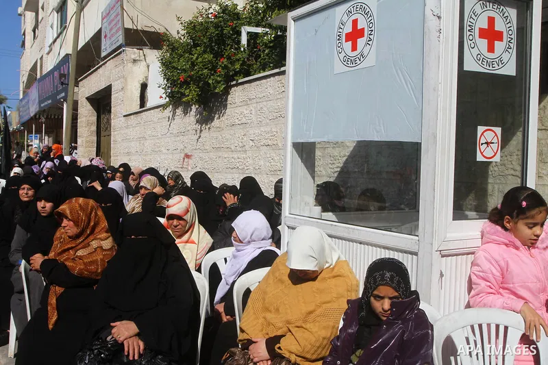 Palestinians participate in a demonstration calling for release of Palestinian prisoners held in the Israeli jails at the Red Cross headquarters in Gaza City, on Jan. 24, 2012. Photo by Ashraf Amra
