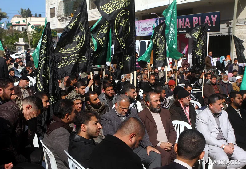 Palestinian Jihad Islamic supporters participate in a demonstration calling for release of Palestinian prisoners held in the Israeli jails at the Red Cross headquarters in Gaza City, on Jan. 24, 2012. Photo by Ashraf Amr...