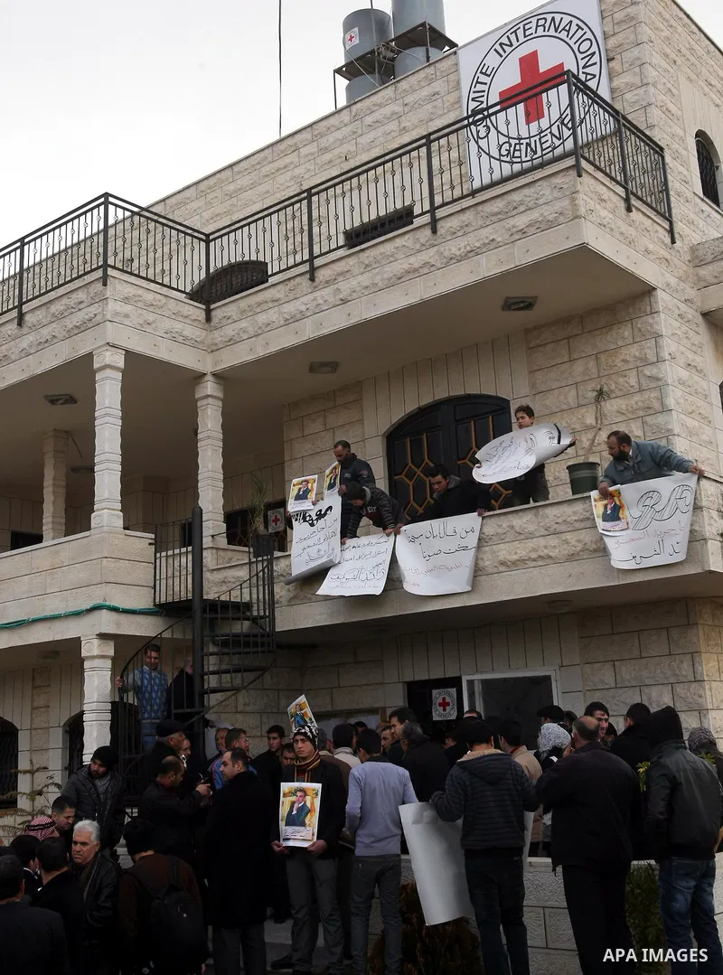 Palestinians participate in a demonstration calling for release of Journalist Raed Sharif, held in the Israeli jails . in the West Bank city of Hebron, Jan. 26, 2012. Israel is currently holding thousands of Palestinians...