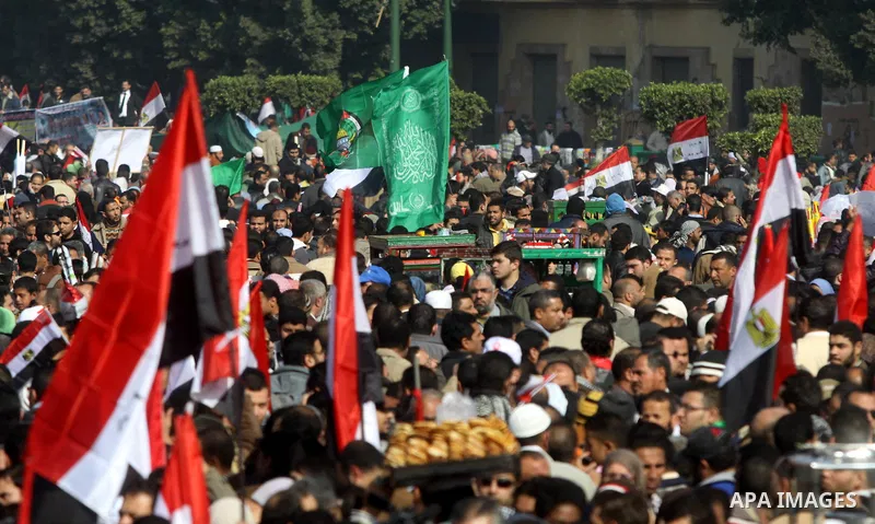 Egyptian demonstrators gather to celebrate the one year anniversary of the 25th January uprising at Tahrir square in Cairo, Egypt, 25 January 2012. One year earlier the same day Egyptians started an uprising which result...