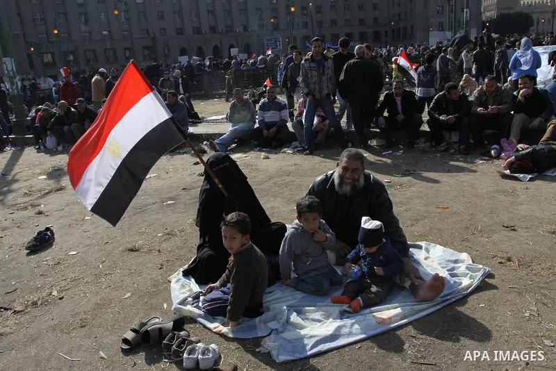 Egyptian demonstrators gather to celebrate the one year anniversary of the 25th January uprising at Tahrir square in Cairo, Egypt, 25 January 2012. One year earlier the same day Egyptians started an uprising which result...