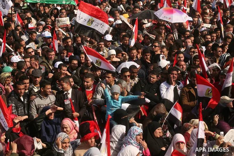 Egyptian demonstrators gather to celebrate the one year anniversary of the 25th January uprising at Tahrir square in Cairo, Egypt, 25 January 2012. One year earlier the same day Egyptians started an uprising which result...