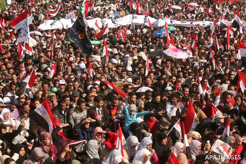 Egyptian demonstrators gather to celebrate the one year anniversary of the 25th January uprising at Tahrir square in Cairo, Egypt, 25 January 2012. One year earlier the same day Egyptians started an uprising which result...