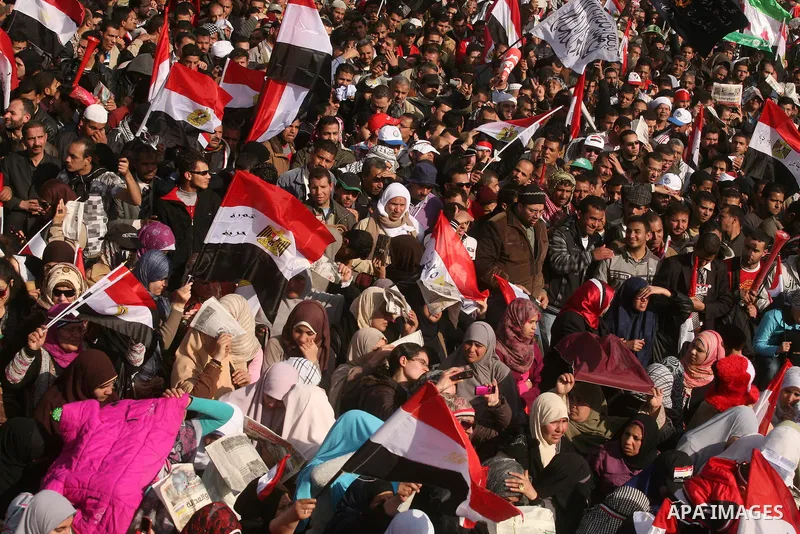 Egyptian demonstrators gather to celebrate the one year anniversary of the 25th January uprising at Tahrir square in Cairo, Egypt, 25 January 2012. One year earlier the same day Egyptians started an uprising which result...