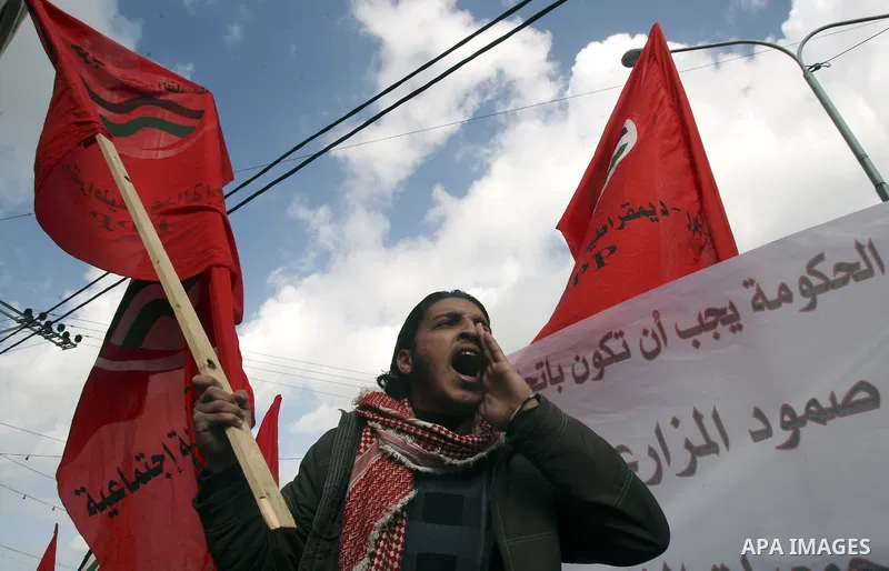 Palestinians protest against rising prices and taxes in the West Bank city of Tul Karem. Thursday, Jan. 26, 2012. Palestinian Authority Prime Minister Salam Fayyad has sparked a furor with a push to get Palestinians to p...