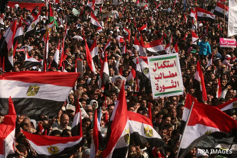 Egyptian demonstrators gather to celebrate the one year anniversary of the 25th January uprising at Tahrir square in Cairo, Egypt, 25 January 2012. One year earlier the same day Egyptians started an uprising which result...