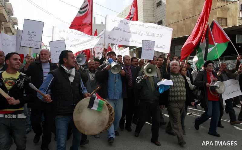 Palestinians protest against rising prices and taxes in the West Bank city of Tul Karem. Thursday, Jan. 26, 2012. Palestinian Authority Prime Minister Salam Fayyad has sparked a furor with a push to get Palestinians to p...