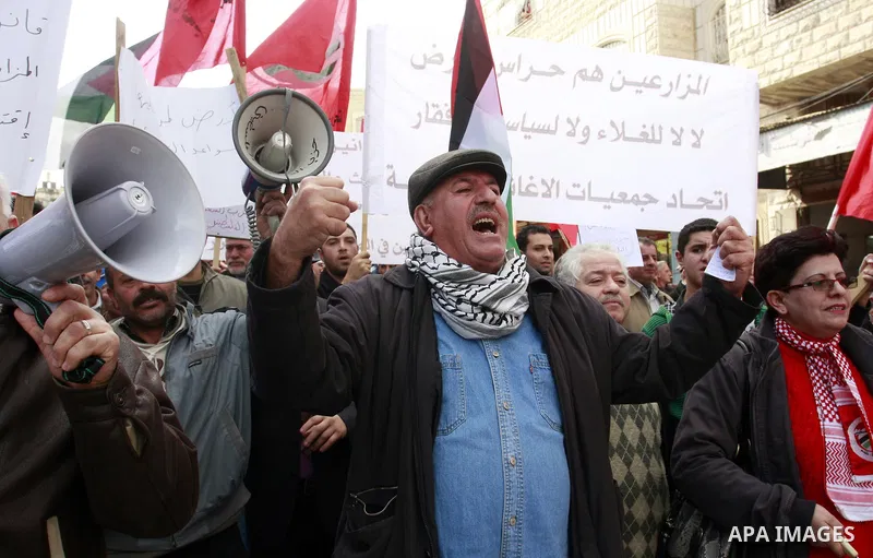 Palestinians protest against rising prices and taxes in the West Bank city of Tul Karem. Thursday, Jan. 26, 2012. Palestinian Authority Prime Minister Salam Fayyad has sparked a furor with a push to get Palestinians to p...