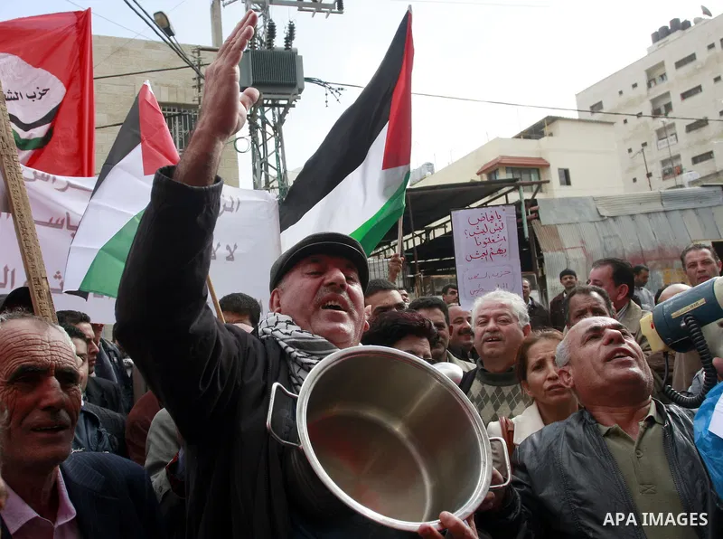 Palestinians protest against rising prices and taxes in the West Bank city of Tul Karem. Thursday, Jan. 26, 2012. Palestinian Authority Prime Minister Salam Fayyad has sparked a furor with a push to get Palestinians to p...