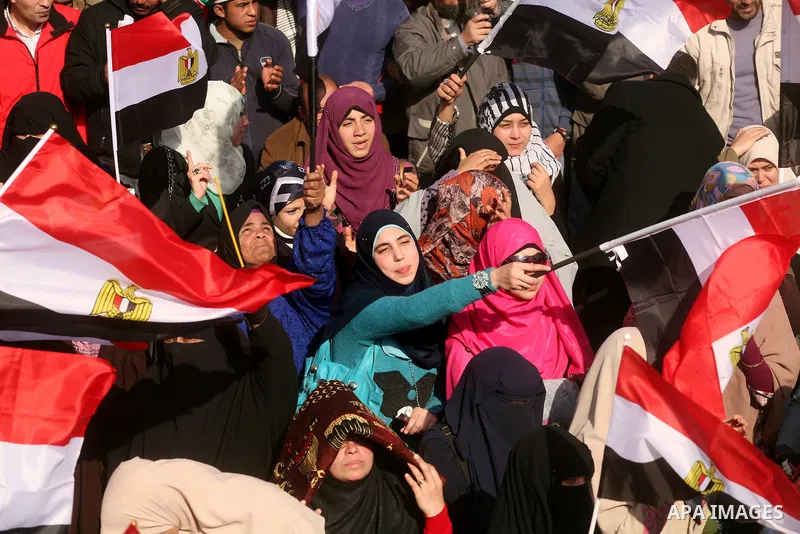 Egyptian demonstrators gather to celebrate the one year anniversary of the 25th January uprising at Tahrir square in Cairo, Egypt, 25 January 2012. One year earlier the same day Egyptians started an uprising which result...
