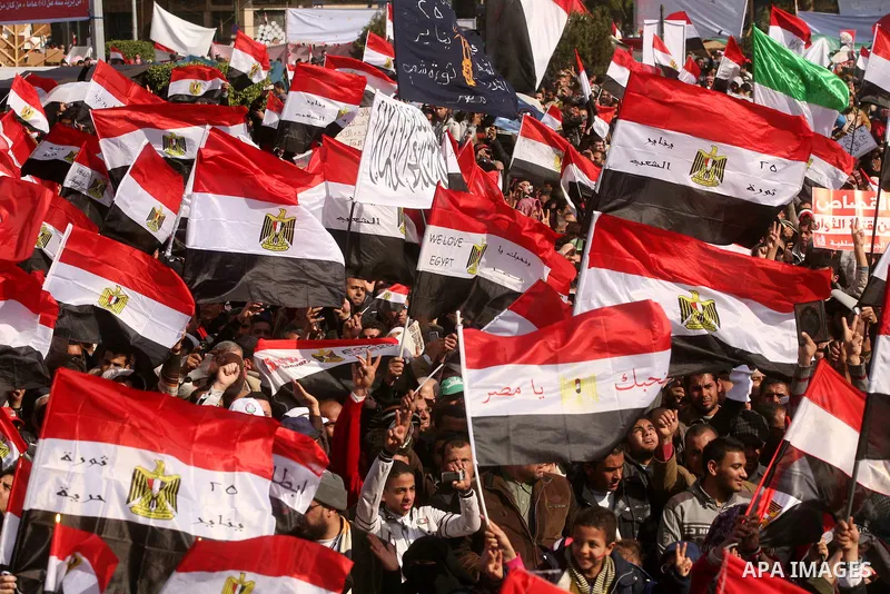 Egyptian demonstrators gather to celebrate the one year anniversary of the 25th January uprising at Tahrir square in Cairo, Egypt, 25 January 2012. One year earlier the same day Egyptians started an uprising which result...