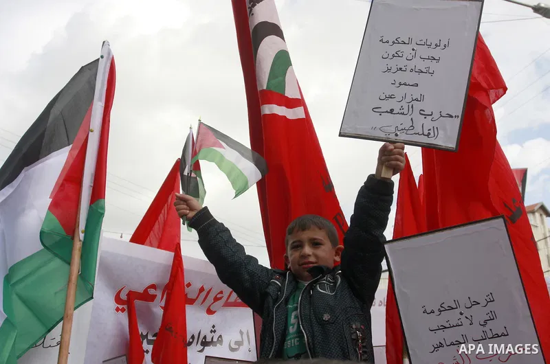 Palestinians protest against rising prices and taxes in the West Bank city of Tul Karem. Thursday, Jan. 26, 2012. Palestinian Authority Prime Minister Salam Fayyad has sparked a furor with a push to get Palestinians to p...