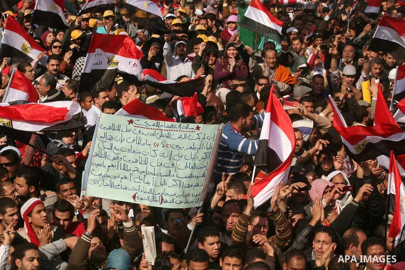 Egyptian demonstrators gather to celebrate the one year anniversary of the 25th January uprising at Tahrir square in Cairo, Egypt, 25 January 2012. One year earlier the same day Egyptians started an uprising which result...