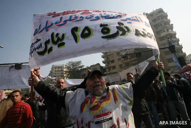 Egyptian demonstrators gather to celebrate the one year anniversary of the 25th January uprising at Tahrir square in Cairo, Egypt, 25 January 2012. One year earlier the same day Egyptians started an uprising which result...