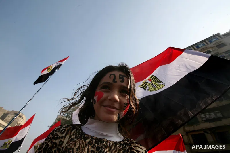 Egyptian demonstrators gather to celebrate the one year anniversary of the 25th January uprising at Tahrir square in Cairo, Egypt, 25 January 2012. One year earlier the same day Egyptians started an uprising which result...