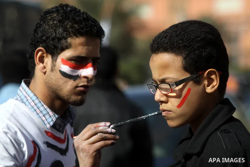 Demonstrators take part in a protest at Tahrir square in Cairo January 26, 2012. Scores of Egyptian youth protesters marking the one-year anniversary of the uprising that ousted Hosni Mubarak bedded down in Tahrir Square...