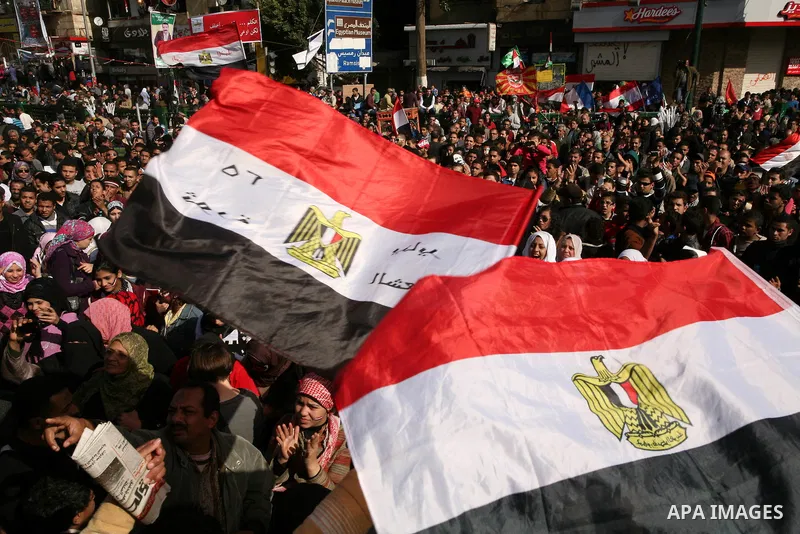 Demonstrators take part in a protest at Tahrir square in Cairo January 26, 2012. Scores of Egyptian youth protesters marking the one-year anniversary of the uprising that ousted Hosni Mubarak bedded down in Tahrir Square...