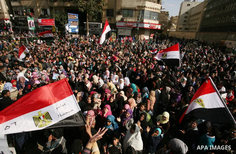 Demonstrators take part in a protest at Tahrir square in Cairo January 26, 2012. Scores of Egyptian youth protesters marking the one-year anniversary of the uprising that ousted Hosni Mubarak bedded down in Tahrir Square...