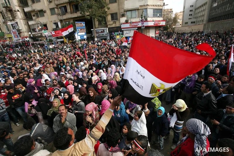 Demonstrators take part in a protest at Tahrir square in Cairo January 26, 2012. Scores of Egyptian youth protesters marking the one-year anniversary of the uprising that ousted Hosni Mubarak bedded down in Tahrir Square...